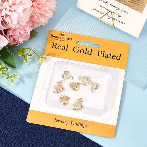 Beebeecraft 9Pcs 3 Styles Cubic Zirconia Fish Charms 18K Gold Plated Summer Sea Fish Pendant Charm with Storage Box for DIY Jewelry Crafts Necklac...