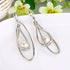 EVER FAITH Women's Austrian Crystal Simulated Pearl Twist Chandelier Teardrop Dangle Earrings Clear...