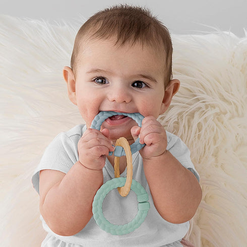 Itzy Ritzy's Teething Gift Set; includes 1 Teething Mitt, 1 Popper Toy & 3 Linking Rings...