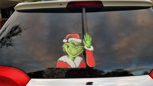 Grim Santa Waving Winter WiperTag with Decal attaches to rear vehicle wiper blade...