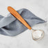 nambe Curvo Kitchen Ladle | 12.5 Inch Ladle for Serving Soups, Stews, and Sauces | Made of Stainless Steel and Acacia Wood | Designed by Steve Coz...