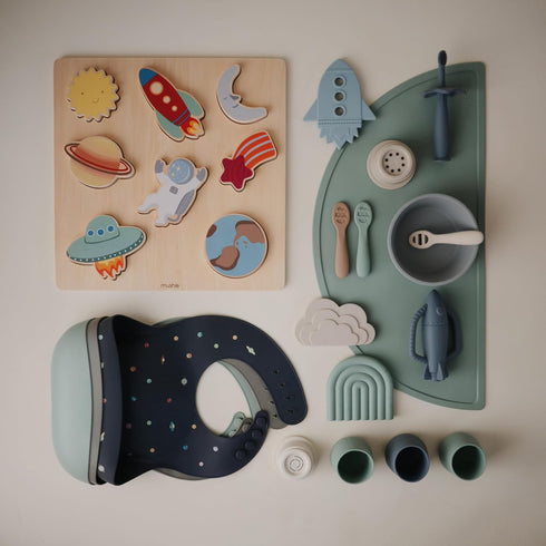 mushie Silicone Baby Bib | Adjustable Fit Waterproof Bibs (Planets)...