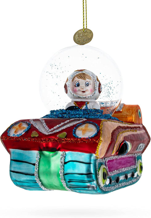 Astronaut in Space Vehicle Blown Glass Christmas Ornament...