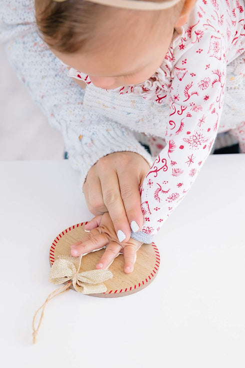 Pearhead Christmas Baby Handprint Wooden Ornament, Baby's First Christmas, Holiday Keepsake, Rustic Hanging Ornament with Burlap Bow, Includes Non...