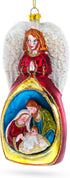 Angel Above Nativity Scene Blown Glass Christmas Ornament...