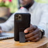 CLCKR Case Designed for iPhone 14 Pro with Phone Grip | Ultra-Thin Phone Case with Phone Stand | 6.1 Inch Clear Black | Shockproof Phone Holder wi...