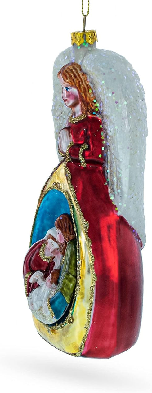 Angel Above Nativity Scene Blown Glass Christmas Ornament...