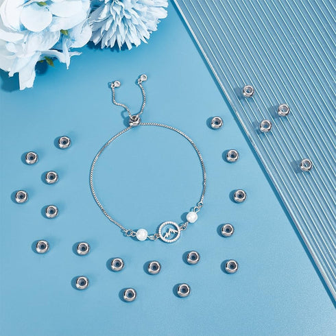 UNICRAFTALE About 50pcs Rondelle Stopper Beads with Rubber Inside Metal Loose Beads 2mm Hole Stainless Steel Bead Spacers for Jewelry Making Findi...