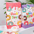 VGOODALL 24PCS Donut Party Favor Bags, Paper Gift Bags Goodie Bags with Stickers Candy Bags for Kids Birthday Party...