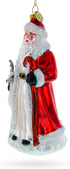 Santa Guided by White Reindeer Glass Christmas Ornament...