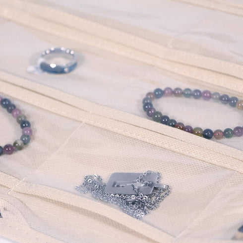 DIOMMELL 80 Pockets Hanging Jewelry Organizer for women, Storage Bag for Earrings Necklace Bracelet Ring accessory display holder, Beige...