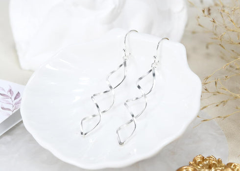 AeraVida Classy Twisting Infinity Marquise Loops .925 Sterling Silver Linear Drop Dangle Earrings | Elegant Silver Earrings for Women | Sterling S...