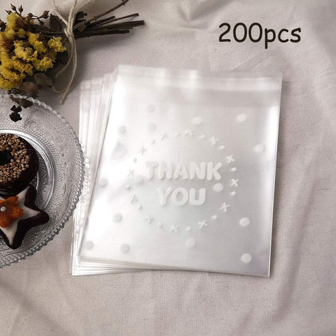200pcs Clear Self-Adhesive Treat Bags – Cellophane Cookie & Candy Bags with “THANK YOU” Design for Bakery & Party Favors (5.5” x 5.5”)...