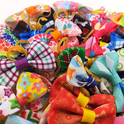 100Pcs Pet Dog Hair Bows Bowknot Topknot with Rubber Bands Cat Puppy Headdress Grooming Hair Accessories Random Color...