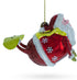 Santa Snowboarding Blown Glass Christmas Ornament...