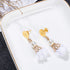 UNICRAFTALE 100pcs Golden Stainless Steel Flat Round Blank Earring Pins Stud Earring Posts 10mm Flat Pad with Loop Earring DIY Components for Earr...