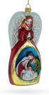 Angel Above Nativity Scene Blown Glass Christmas Ornament...