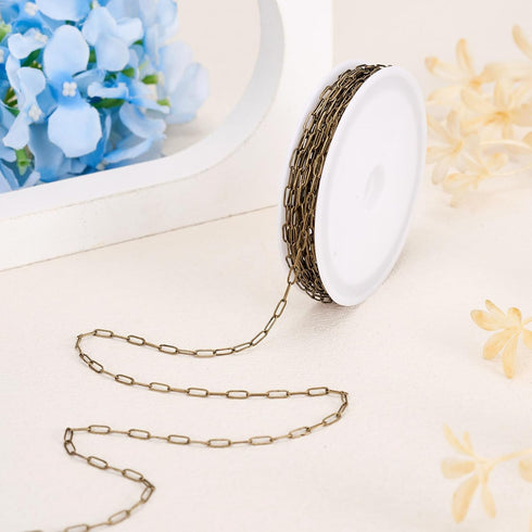 Craftdady 16.4 Feet Antique Bronze Paperclip Link Chain Brass Soldered Oval Cable Cross Chain 7x2.6mm with Spool for Jewelry Pendant Necklace Brac...