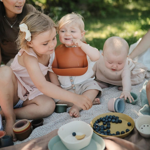 mushie Silicone Baby Bib | Adjustable Fit Waterproof Bibs (Vanilla Confetti)...