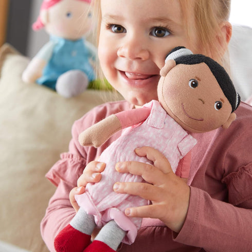 HABA Snug Up Doll Rumbi - 10" Soft Doll with Black Hair and Pink Overalls - Machine Washable for 18 Months and Up...