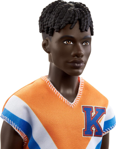 Barbie Fashionistas Ken Fashion Doll with Twisted Black Hair Wearing Orange Athletic Jersey, Shorts & White Sneakers...