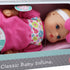 Baby's First Doll 11' Classic Softina with Pink & Foral Jumper & Headband, Surface Washable, for Ages 1+...