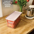 Rosanna Pansino x iDesign Recycled Plastic Kitchen Storage Bin with Lid, Clear Bin/Lavender Sprinkles Lid, 6" x 12" x 6"...