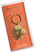 Night Owl Paper Goods Keychain, Gold Approx. 1-1/2 inch wide x 2 inches taller...