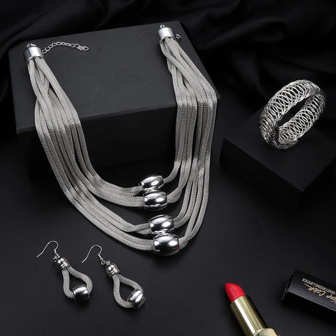 JOERICA 3Pcs Multi-Layer Bib Necklace African Jewelry Set for Women Choker Necklace Stretch Cuff Bracelet Dangle Earrings Halloween Costume Jewelr...