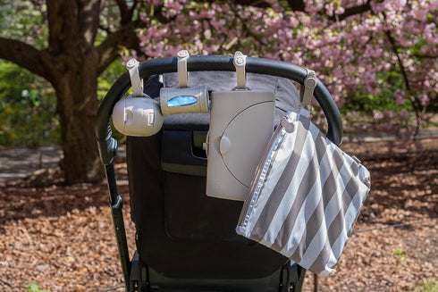 Ubbi Retractable On-the-Go Bag Dispenser for Baby Travel, Diaper Bag Accessory Must Have for Newborns, Helpful Baby Accessory, Taupe...