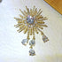 Fantastic Gold Tone Atomic CZ and Pearl Beads Starburst Brooch with Trio Drop...