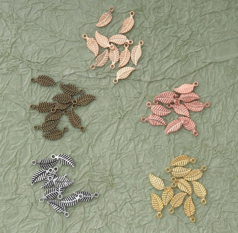 50 Pcs Leaf Charm Beads Metal Small 1.4 x 0.6 cm Tree Leaves Pendants for Crafting Jewelry Making Kit Findings Necklace Bracelet DIY Decoration Su...