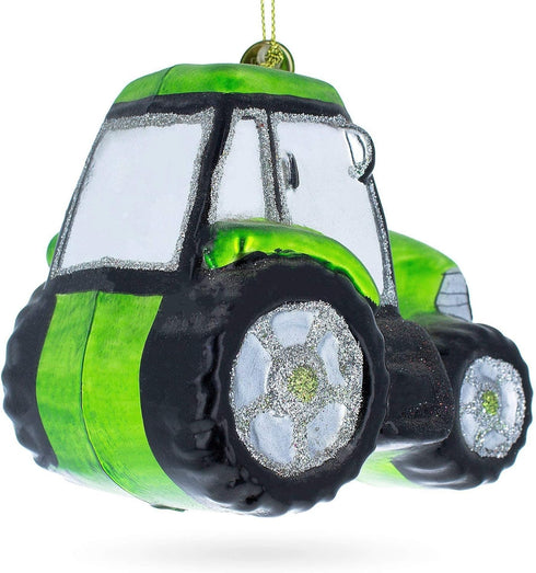 Rustic Green Tractor Blown Glass Christmas Ornament...