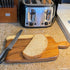 Solid Acacia Wood Cutting and Serving Board with Handle – Handmade, Joint Free Displaying Beautiful Continuous Wood Grains, Double-Sided, Small Ch...