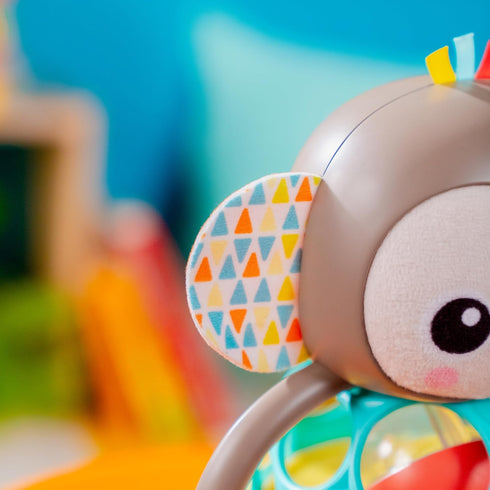 Bright Starts Grab & Giggle Monkey Light-Up Musical Rattle Toy with Easy-Grasp Oball, Ages 6 Months+, Unisex...