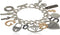 GUESS "Basic Mixed Metal Logo Charm Toggle Charm Bracelet...