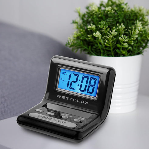 Westclox LCD Digital Bedside Alarm Clock with Blue Backlit Display and Snooze Function, Battery Operated, (Black, 3-Inch)...