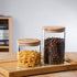 MOLFUJ 960 ML / 32 FL Oz Glass Storage Container with Wood Lid, Stackable Clear Decorative Organizer Bottle Canister Pantry Jar with Air Tight Woo...