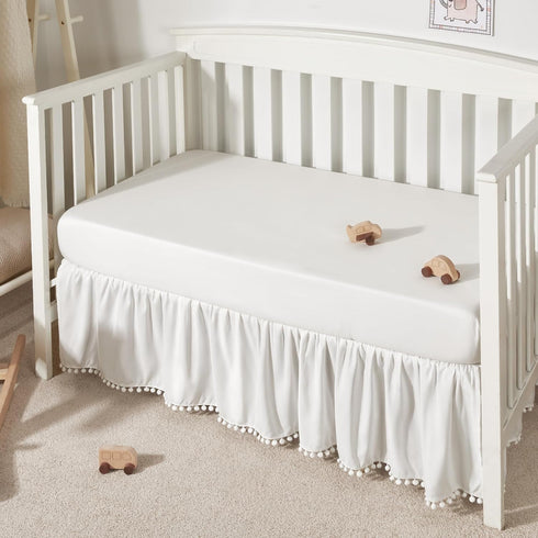 TILLYOU Baby Crib Skirt Girls Boys, Ruffled Bed Skirt with Pompoms, 28”x 52”, 14'' Drop, White...