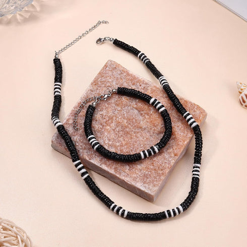 JOERICA Puka Shell Necklace for Men Women Sea Shell Surfer Necklace and Bracelet Set with Clam Chip Coconut Beads Pookah Shells Choker Necklace an...
