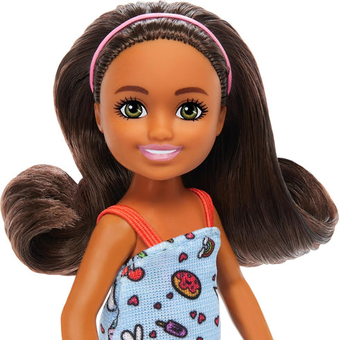 Barbie Chelsea Doll, Small Doll Wearing Removable Blue Dress with Colorful Print & Pink Shoes, Brown Hair & Green Eyes...