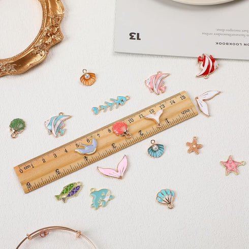 MARFOREVER 120 Pcs Ocean Themed Sea Charms for Jewelry Making, Assorted Gold Enamel Starfish Seashell Marine Pendants for Necklace Earring Bracele...
