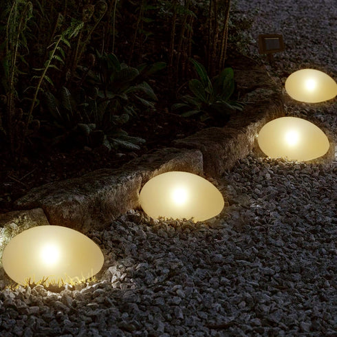 SUNNYPARK Solar Garden Lights Outdoor Set of 4 Plastic Pebble Shape Decorative Rock Lights Waterproof - Warm White...