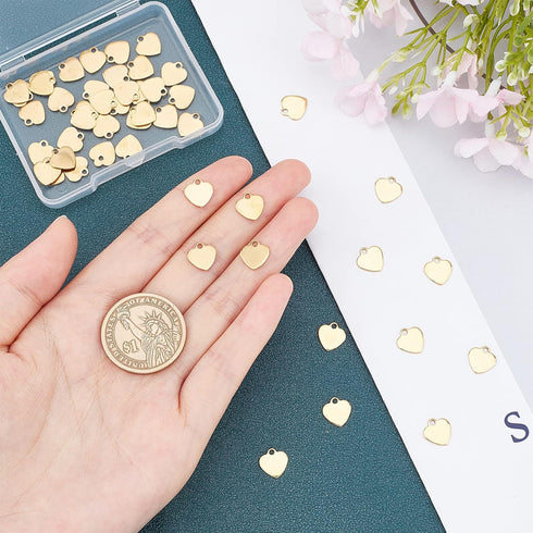 UNICRAFTALE 50pcs Golden Heart Charm Stainless Steel Love Pendant Flat Heart Charm 1.2mm Hole Blank Metal Tiny Pendant for DIY Jewelry Making 9.5m...