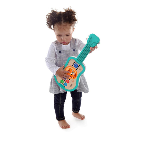 Baby Einstein Sing & Strum Magic Touch Ukulele Wooden Musical Toy, Ages 6 Months+, Multicolored...