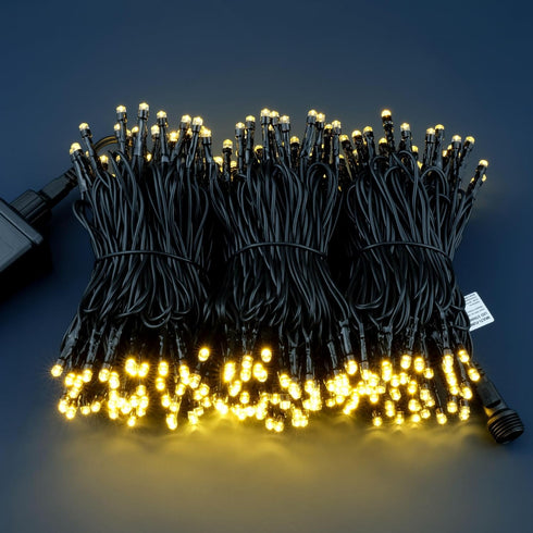 YULETIME 100 ft 300 Count Warm White LED String Lights with 8 Models Adapter, Black Wire Wide Angle 5mm Christmas Lights (Warm White - Black Wire)...