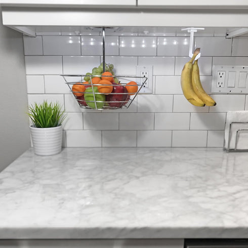 Banana Hanger - Under Cabinet Hook for Bananas or Other Lightweight Kitchen Items. Hook Folds-up When Not in Use. Self-adhesive and Pre-drilled Ho...