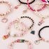 Make It Real - Juicy Couture Pink and Precious Bracelets - DIY Charm Bracelet Making Kit - Friendship Bracelet Kit with Charms, Beads & Cords - Ar...