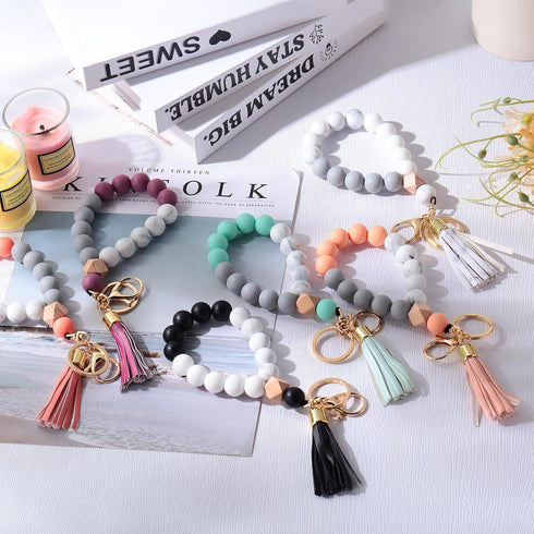 Tondiamo 6 Pcs Silicone Wristlet Keychain for Women Cute Car Key Ring Bracelet Beaded Bangle Chains with Leather Tassel...
