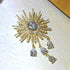 Fantastic Gold Tone Atomic CZ and Pearl Beads Starburst Brooch with Trio Drop...